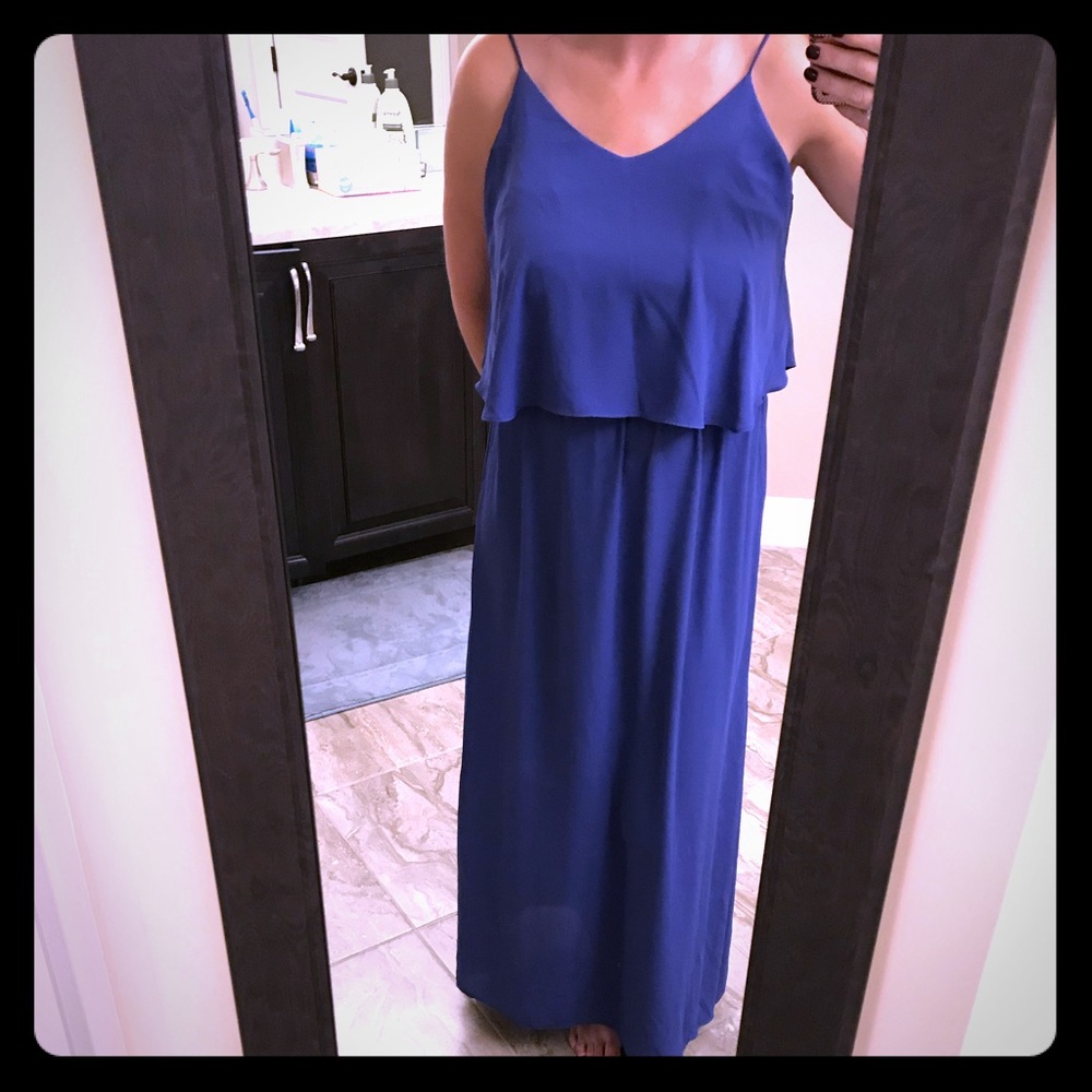 Long flowy blue peplum top maxi dress with slits